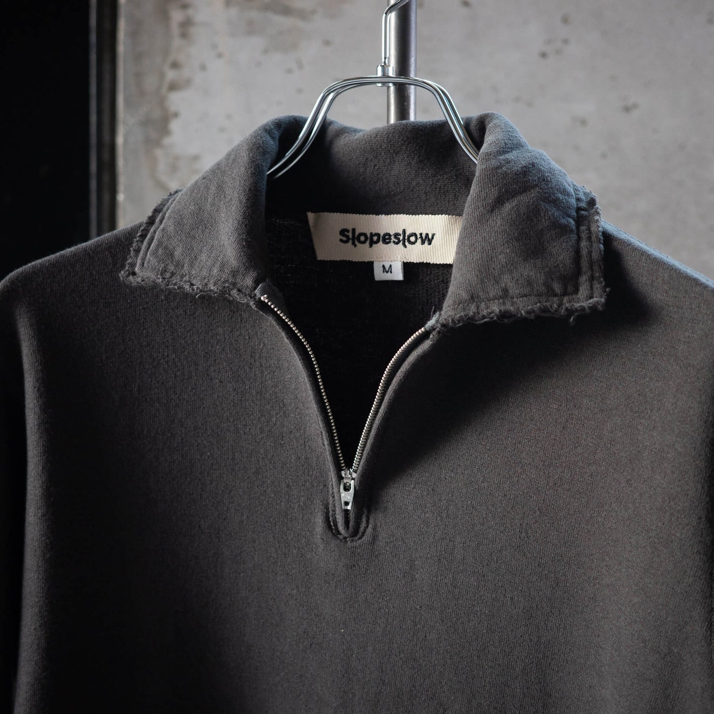 Slopeslow(スロープスロウ)/Half zip top carbon